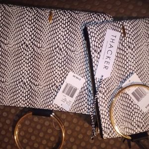 Thacker clutch and matching hand bag